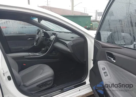 2021 Toyota Avalon Limited Hybrid z USA, uszkodzony, nr VIN 4T1DA1AB7MU004996